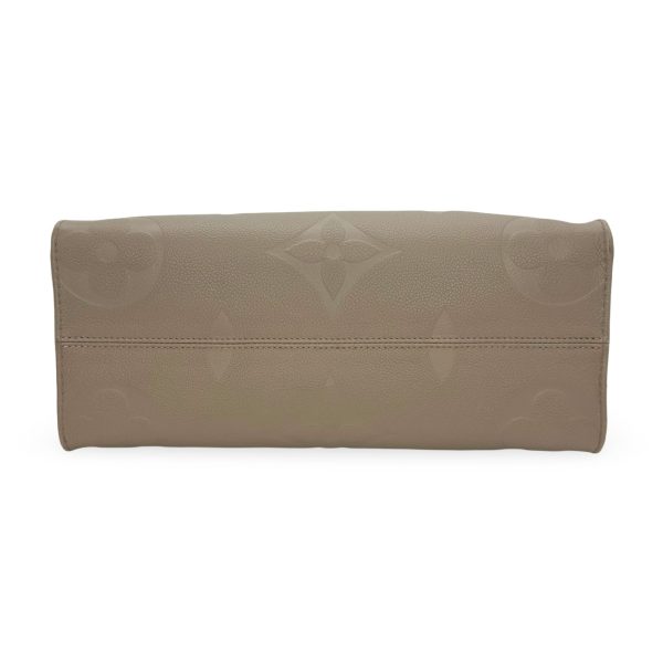 LOUIS VUITTON: Monogram Empreinte Onthego MM on Sale