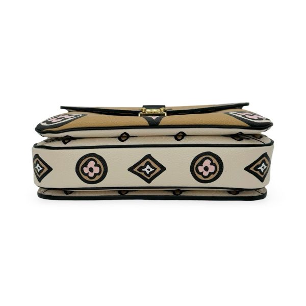 LOUIS VUITTON: Monogram Giant Wild at Heart Pochette Metis Hot on Sale